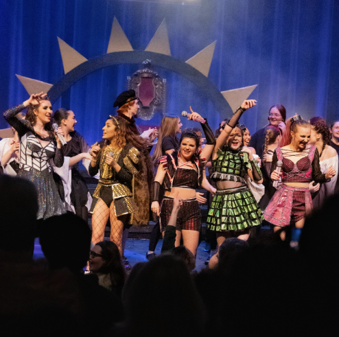 Cast A performing in "SIX"